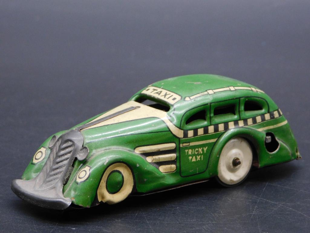 MARX TRICKY TAXI TIN TOY VINTAGE ANTIQUE (1 of 4)
