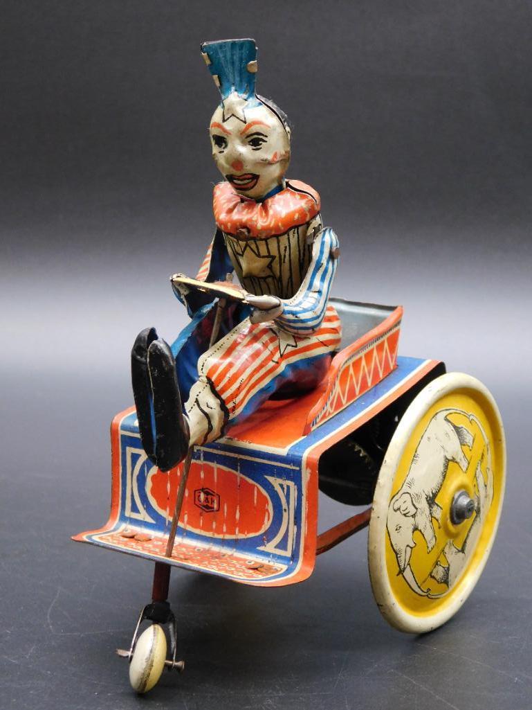 GERMAN CLOWN ON CART METAL TIN TOY (1 of 5)