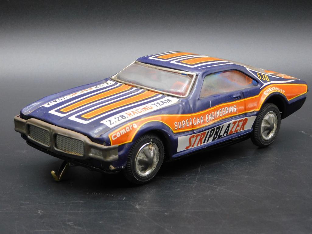 TAIWAN STRIPBLAZER RACE CAR METAL TIN TOY VINTAGE: TAIWAN STRIPBLAZER RACE CAR METAL TIN TOY VINTAGE ANTIQUE *** Thank you for attending HATMAN AUCTIONS! Yes, we ship all items that are not oversized. Please see photos for measurements and description