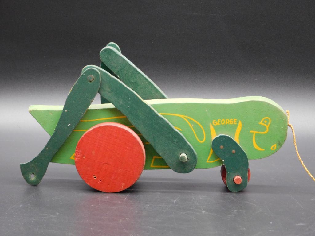 GEORGE THE CATERPILLAR WOODEN PULL TOY: GEORGE THE CATERPILLAR WOODEN PULL TOY *** Thank you for attending HATMAN AUCTIONS! Yes, we ship all items that are not oversized. Please see photos for measurements and description. SPECIAL NOTICE: M
