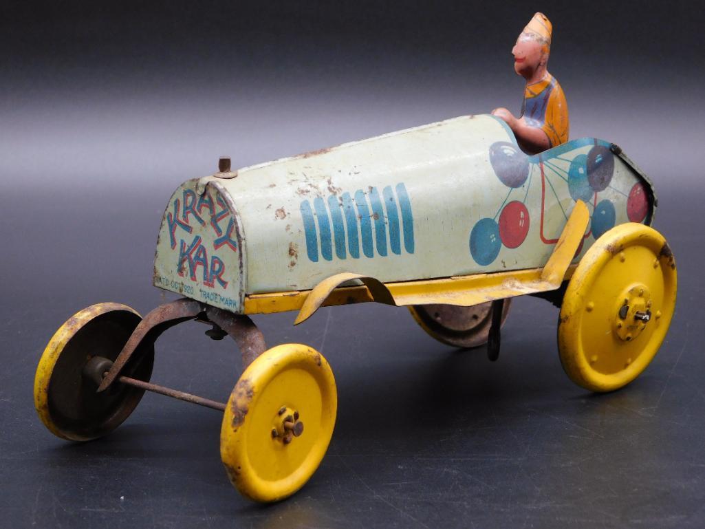 1921 KRAZY KAR METAL TIN TOY: 1921 KRAZY KAR METAL TIN TOY *** Thank you for attending HATMAN AUCTIONS! Yes, we ship all items that are not oversized. Please see photos for measurements and description. SPECIAL NOTICE: Many items 