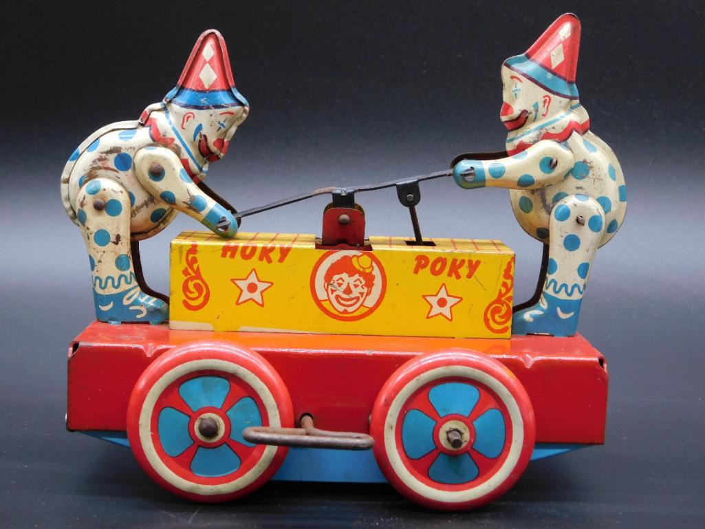 WYANDOTTE TOYS HOKY POKY TIN CLOWN RAILROAD CAR VINTAGE: WYANDOTTE TOYS HOKY POKY TIN CLOWN RAILROAD CAR VINTAGE ANTIQUE *** Thank you for attending HATMAN AUCTIONS! Yes, we ship all items that are not oversized. Please see photos for measurements and descr