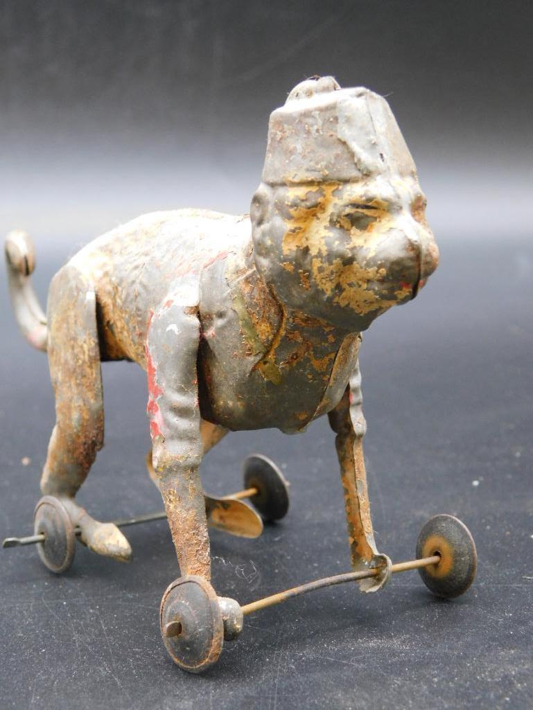 METAL MONKEY ON WHEELS TIN TOY VINTAGE ANTIQUE (1 of 3)