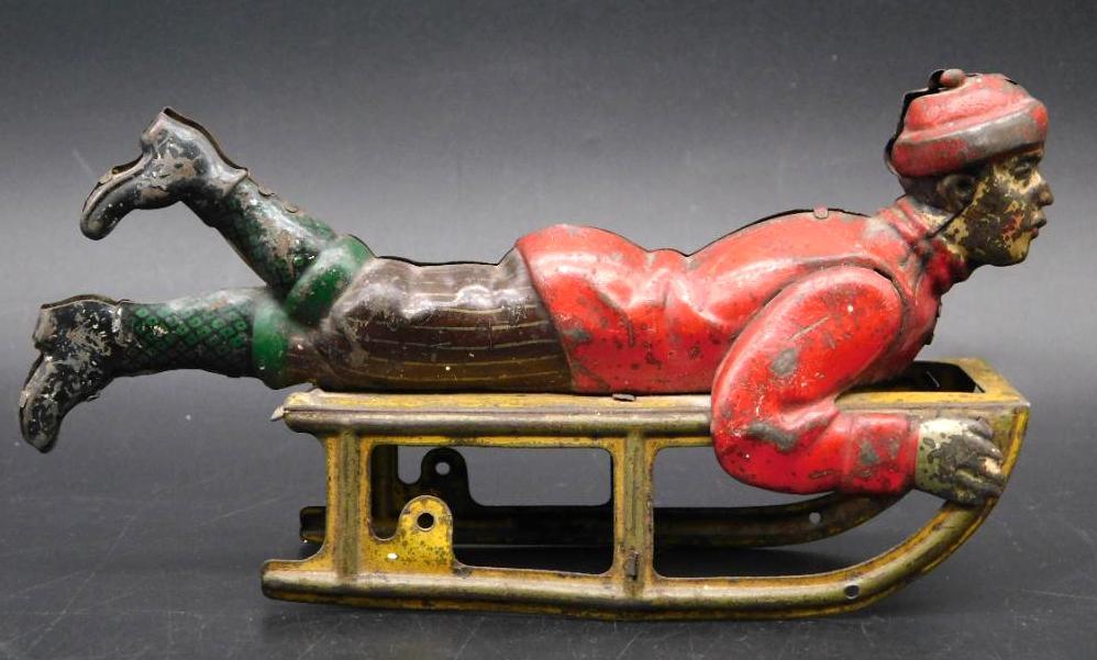 GERMAN MARKE HESS-ROLLER KISMET TIN TOY BOY ON SLED VINTAGE ANTIQUE (1 of 3)