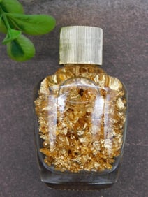 GOLD FLAKES IN BOTTLE ROCK STONE LAPIDARY SPECIMEN