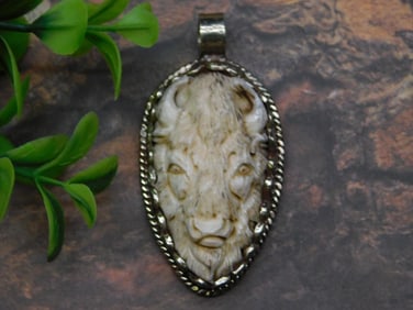 CARVED BONE BISON PENDANT ROCK STONE LAPIDARY SPECIMEN