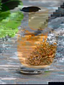 GOLD FLAKES IN BOTTLE ROCK STONE LAPIDARY SPECIMEN