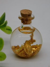 GOLD FLAKES IN BOTTLE ROCK STONE LAPIDARY SPECIMEN