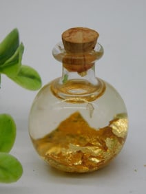 GOLD FLAKES IN BOTTLE ROCK STONE LAPIDARY SPECIMEN