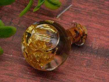 GOLD FLAKES IN BOTTLE ROCK STONE LAPIDARY SPECIMEN