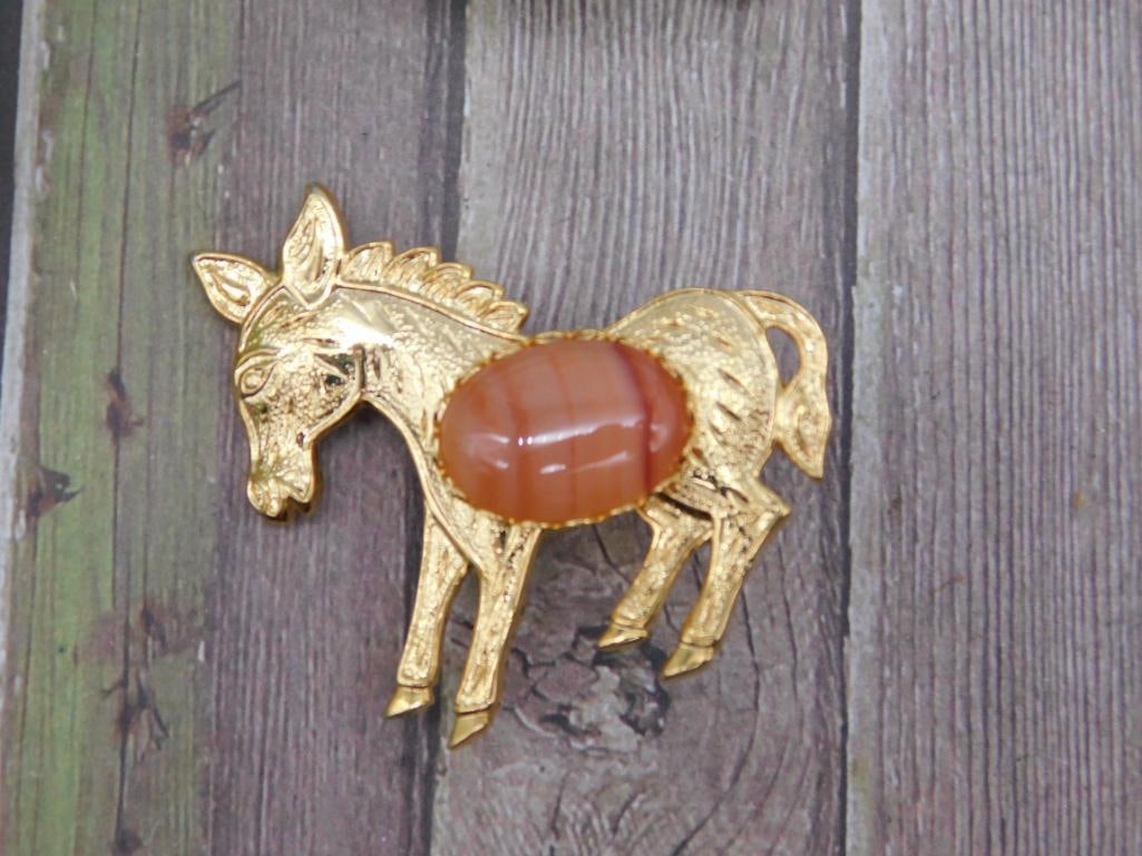 Gold-Tone Donkey Brooch with Orange Stone Accent: Gold-Tone Donkey Brooch with Orange Stone Accent