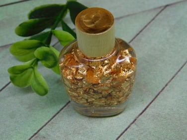 GOLD FLAKES IN BOTTLE ROCK STONE LAPIDARY SPECIMEN