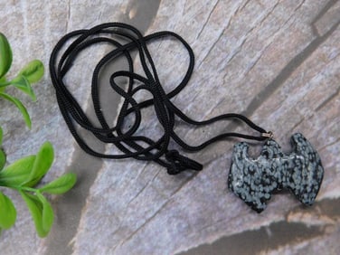 SNOWFLAKE OBSIDIAN BAT PENDANT ON NECKLACE