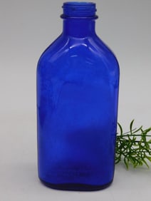 GENUINE PHILLIPS BLUE GLASS BOTTLE VINTAGE ANTIQUE