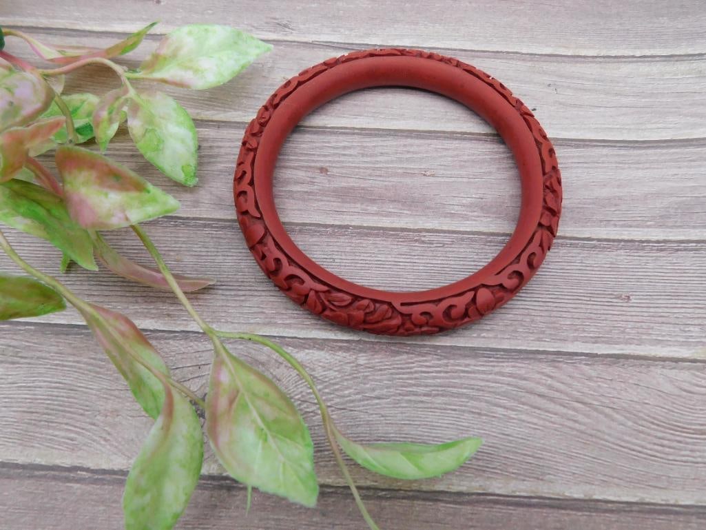 Carved Red Cinnabar Bangle Bracelet with Floral Motif: Carved Red Cinnabar Bangle Bracelet with Floral Motif