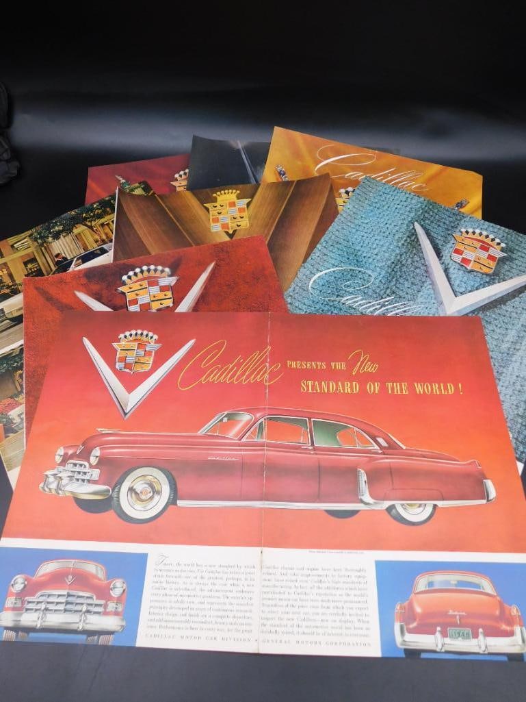 Set of Cadillac Brochures Featuring Various Models and Years: Set of Cadillac Brochures Featuring Various Models and Years