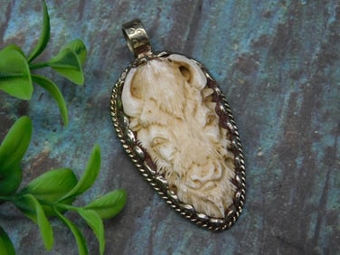 CARVED BONE BISON PENDANT ROCK STONE LAPIDARY SPECIMEN