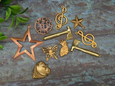 MIXED PENDANTS AND STAMPING LOT