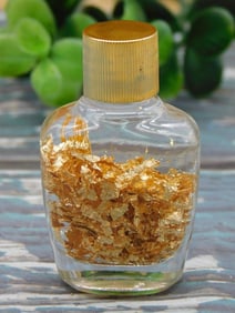 GOLD FLAKES IN BOTTLE ROCK STONE LAPIDARY SPECIMEN