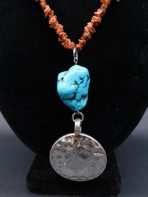 TURQUOISE PENDANT ON GOLDSTONE CHIP NECKLACE