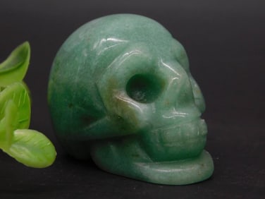 Green Carved Stone Skull