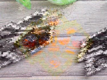 Geometric amber-tone rhinestone brooch