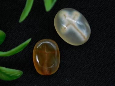 Pair of Cross-Inclusion Cabochon Gemstones