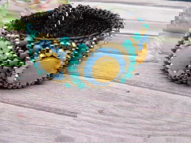 Beaded Adjustable Woven Bracelet with Yellow, Blue, and Green Accents