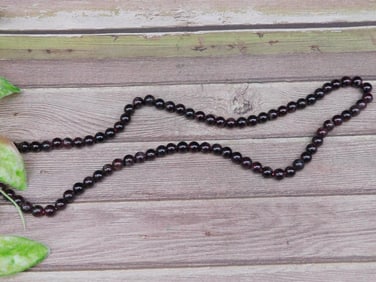 Beaded Necklace With Garnet Stones