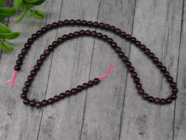 Strand of Round Red Garnet Beads