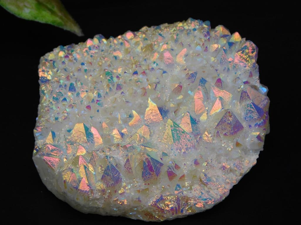 Iridescent Crystal Cluster Specimen With Multicolor Sparkle: Specimen featuring a vibrant array of iridescent crystal formations with a multicolor sheen. The precise measurements are indicated on the ruler for reference. Ideal for collectors or decorative purpo