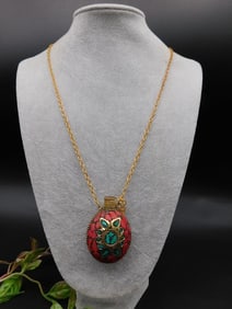 Gold-Tone Necklace With Red and Turquoise Pendant
