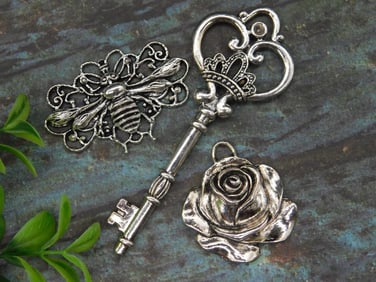 Decorative Key, Bee, and Rose Charms with Silver Tone Finish