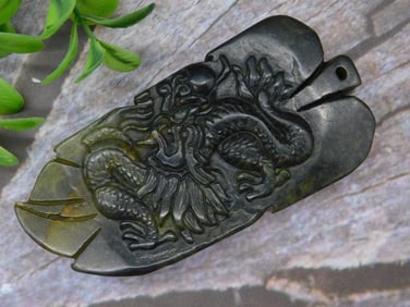 Handcrafted Jade Pendant With Dragon Design