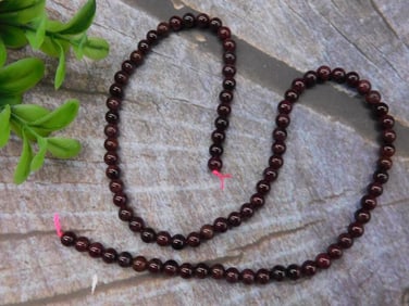Strand of Round Garnet Beads with Measurement in Inches