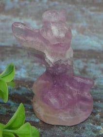 Purple and White Carved Stone Figurine