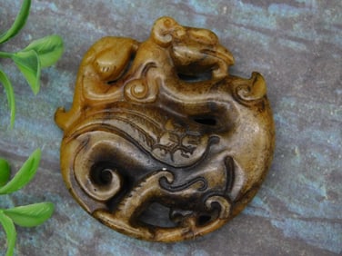 Carved Brown Stone Dragon Pendant