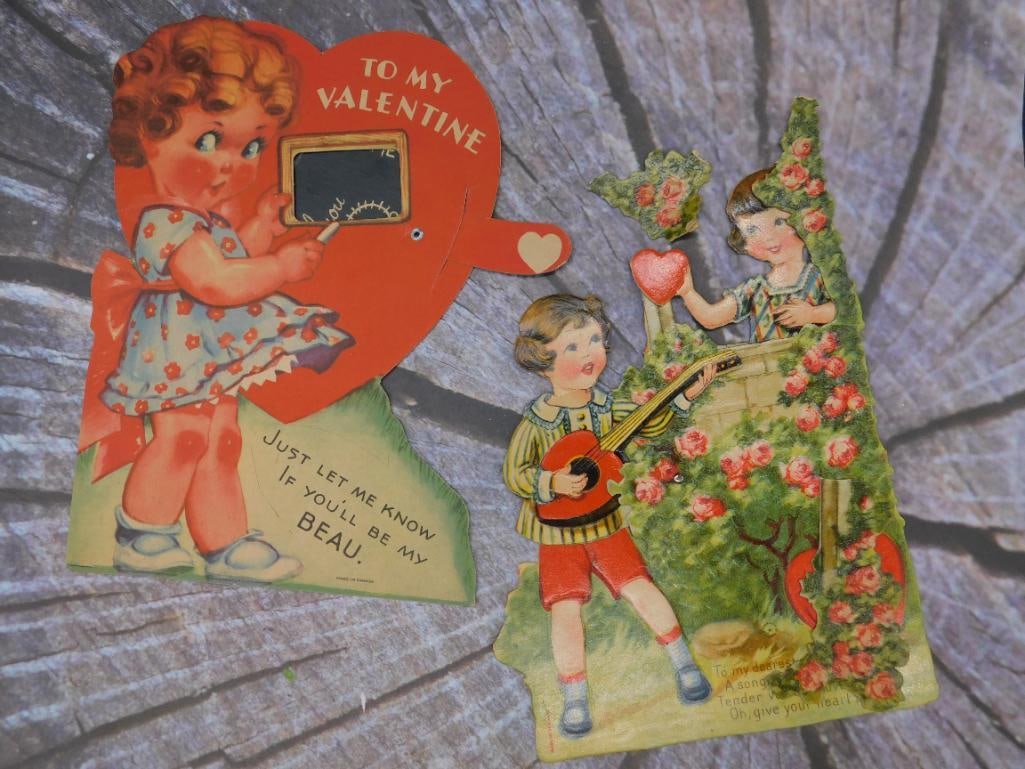 Lot of Vintage Valentine?s Day Cards with Cutout Designs: A lot featuring two vintage Valentine?s Day cards with charming cutout designs. Each card includes intricate illustrations and themed messages, such as 'To My Valentine' on one card and 'Just Let Me K