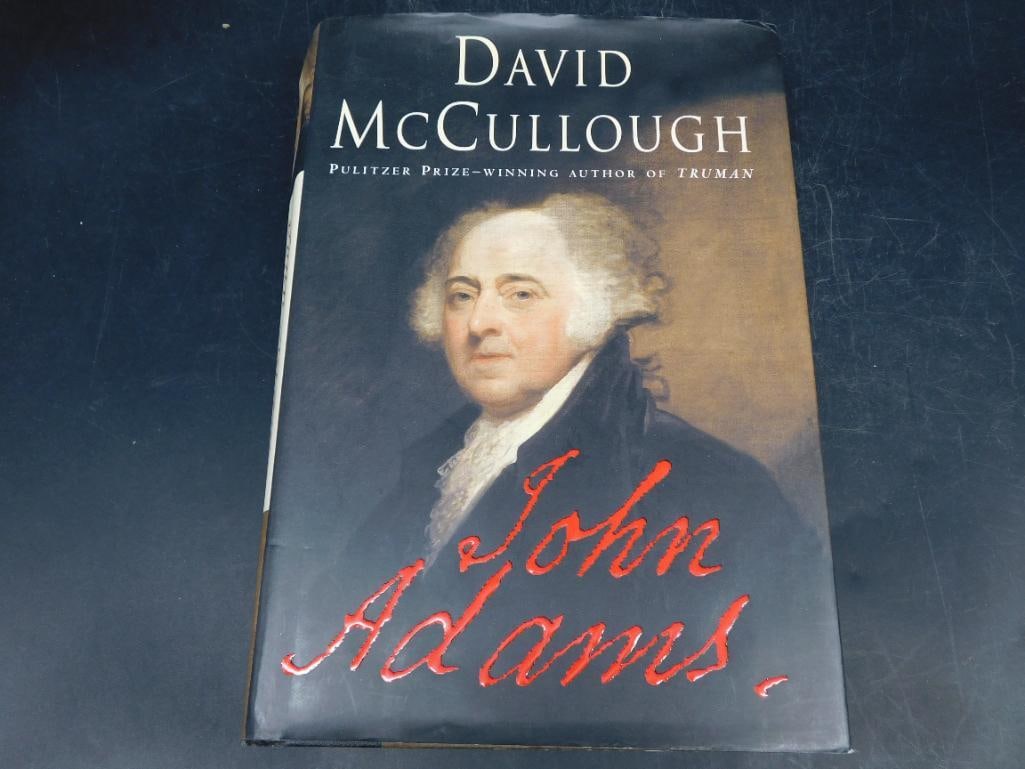 David McCullough?s ?John Adams? Hardcover Biography With Dust Jacket: Hardcover book titled 'John Adams' authored by Pulitzer Prize-winning writer David McCullough. Published by Simon & Schuster, this biography explores the life and legacy of John Adams. The book includ