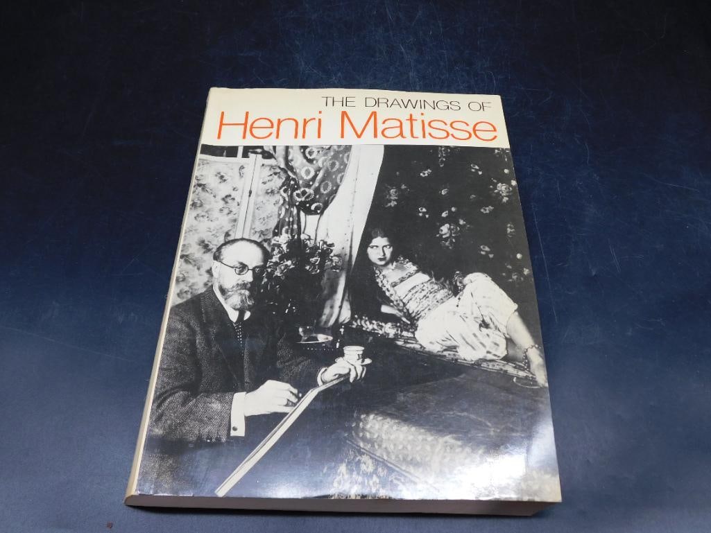 The Drawings of Henri Matisse Book: Hardcover book titled 'The Drawings of Henri Matisse,' published in 1984. Catalog prepared by John Hawkins for Thames and Hudson. Features illustrations and text showcasing Matisse's work, accompanied