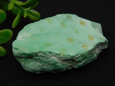 Green Mineral Specimen With Yellow Inclusions