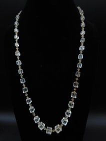 Faceted Clear Beaded Necklace With Decorative Clasp