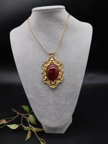 Gold-Tone Pendant Necklace With Red Oval Stone