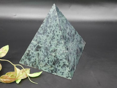 Green Stone Pyramid Sculpture With Patterned Surface