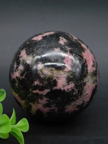 Polished Rhodonite Sphere with Black and Pink Patterns