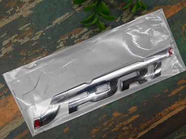 Chrome ?Sport? Emblem for Vehicle Exterior