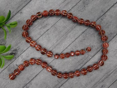 Red and White Swirled Glass Bead Necklace with Striated Design
