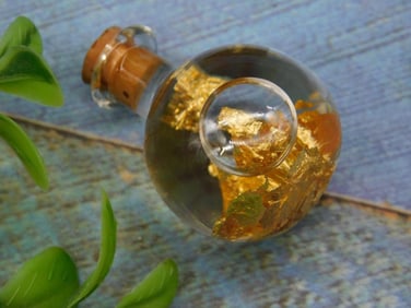 Miniature Glass Bottle With Gold Flakes Inside