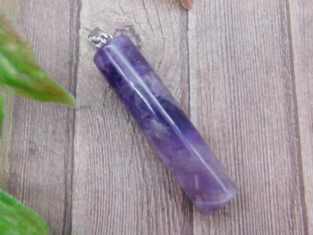 Amethyst Cylinder Pendant With Metal Bail: Amethyst cylinder pendant featuring deep purple hues and natural banding. Comes with a metal bail for easy attachment to chains or cords. Approximate size is indicated in the photo with the ruler. Ide