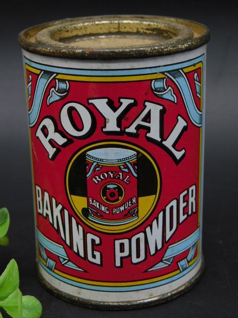 Royal Baking Powder Vintage Tin with Graphic Details: This lot features a vintage Royal Baking Powder tin with well-preserved graphic details on both sides. The front displays the brand lettering and logo in bold colors, while the back contains product i